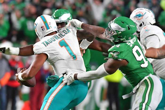 Oct 22, 2023; Philadelphia, Pennsylvania, USA; Miami Dolphins quarterback Tua Tagovailoa (1) is sacked by Philadelphia Eagles defensive end Josh Sweat (94) during the fourth quarter at Lincoln Financial Field.